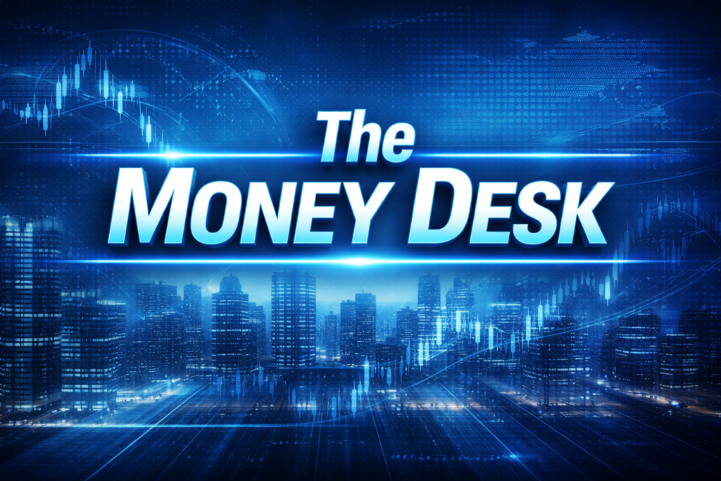 A blue 16:9 digital banner reading “The Money Desk” with a futuristic city skyline, stock market charts, and financial data graphics in the background.