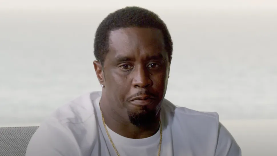 Sean Combs appearing serious in a candid photo before his arrest