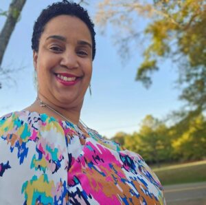 Fruitful Blessings Gourmet Catering serving a busy upscale event led by Shay Perkins with elegant food displays and guests enjoying premium catered dishes