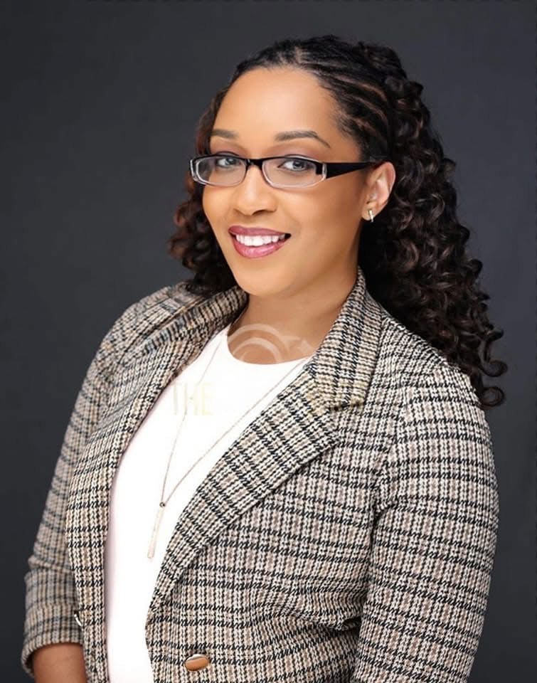 Robin Butler founder of 4U Tax-Pros University smiling in a professional business portrait