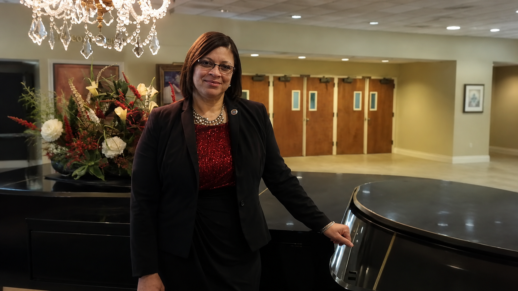 Portrait feature graphic highlighting Jackson, Mississippi entrepreneur Jill Cry Thompson and her work in funeral service and community care.