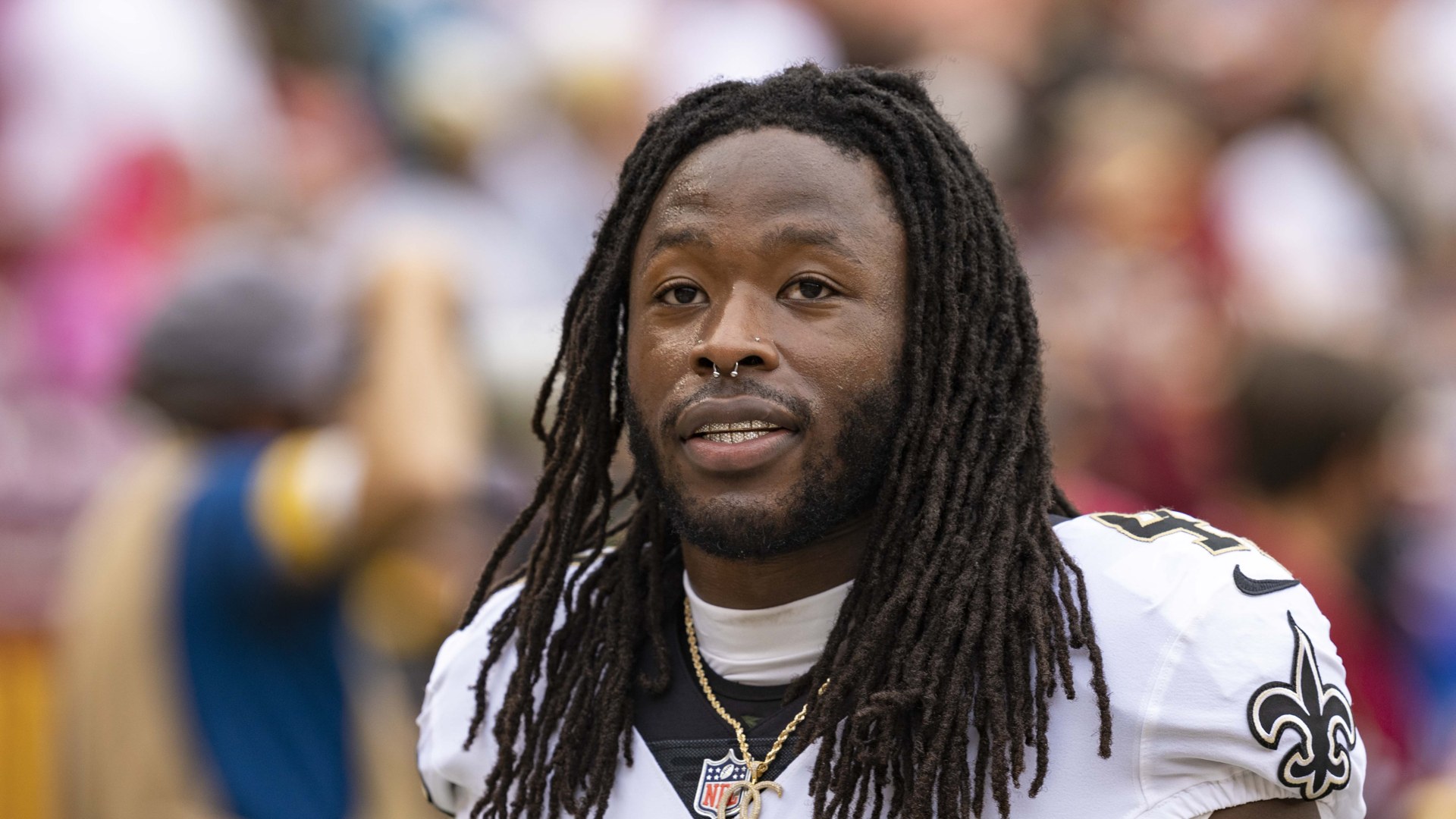 Alvin Kamara carrying the ball for the New Orleans Saints