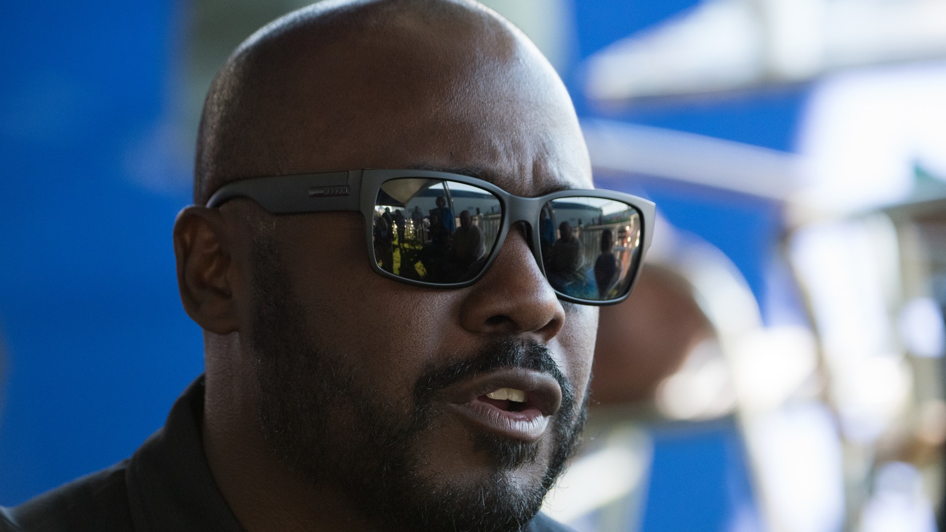 Marshall Faulk smiling in a portrait photo