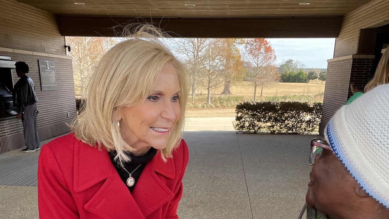 Attorney General Lynn Fitch greets a constituent at the Mississippi Veterans Memorial Cemetery in Newton