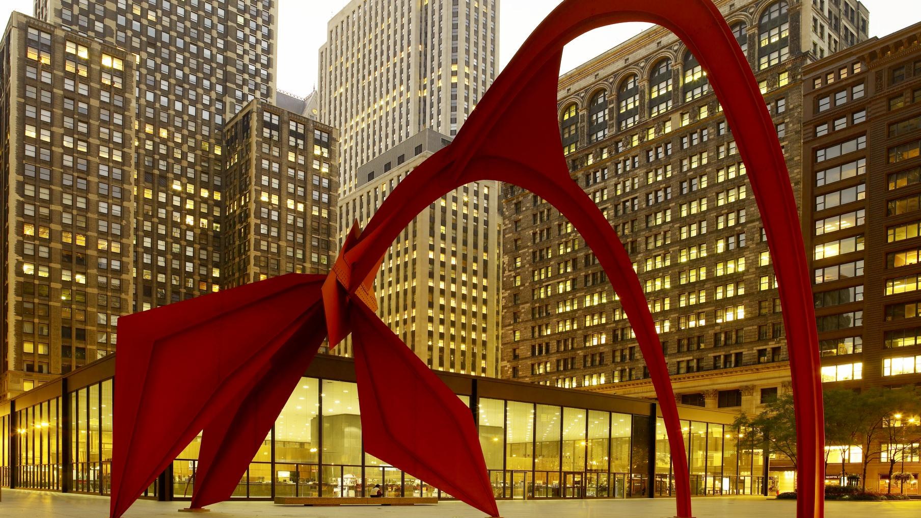 The Flamingo sculpture by Alexander Calder stands in Federal Plaza in front of the Kluczynski Federal Building