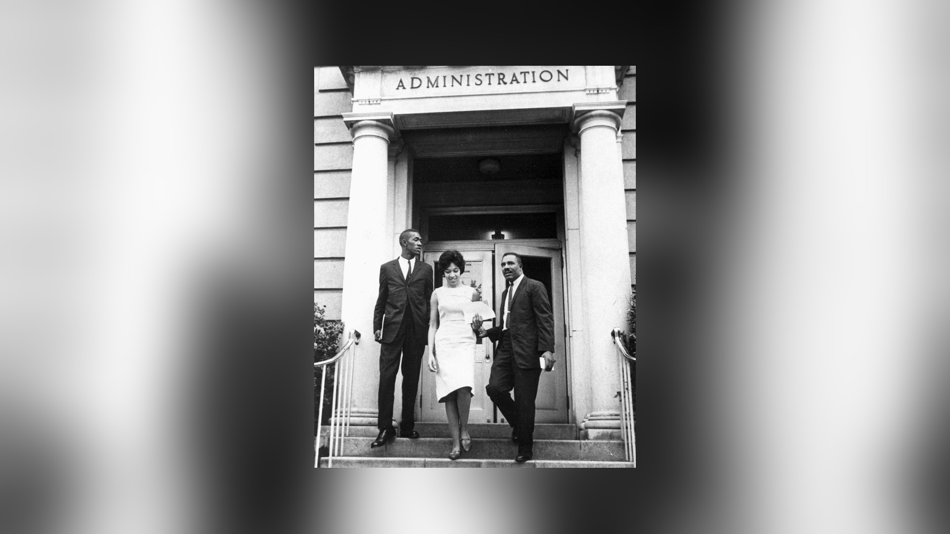 Henrie Monteith walks between Robert Anderson and James Solomon Jr. outside the Osborne Administration Building on September 11, 1963