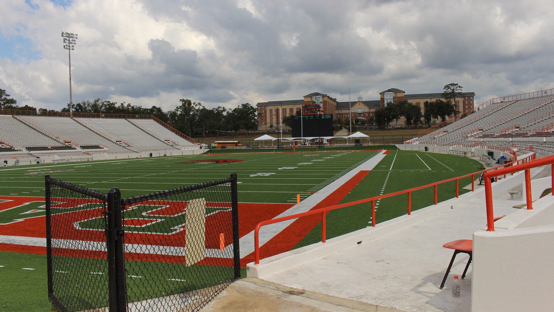 Inside Bragg Memorial Stadium with the football field and empty stands