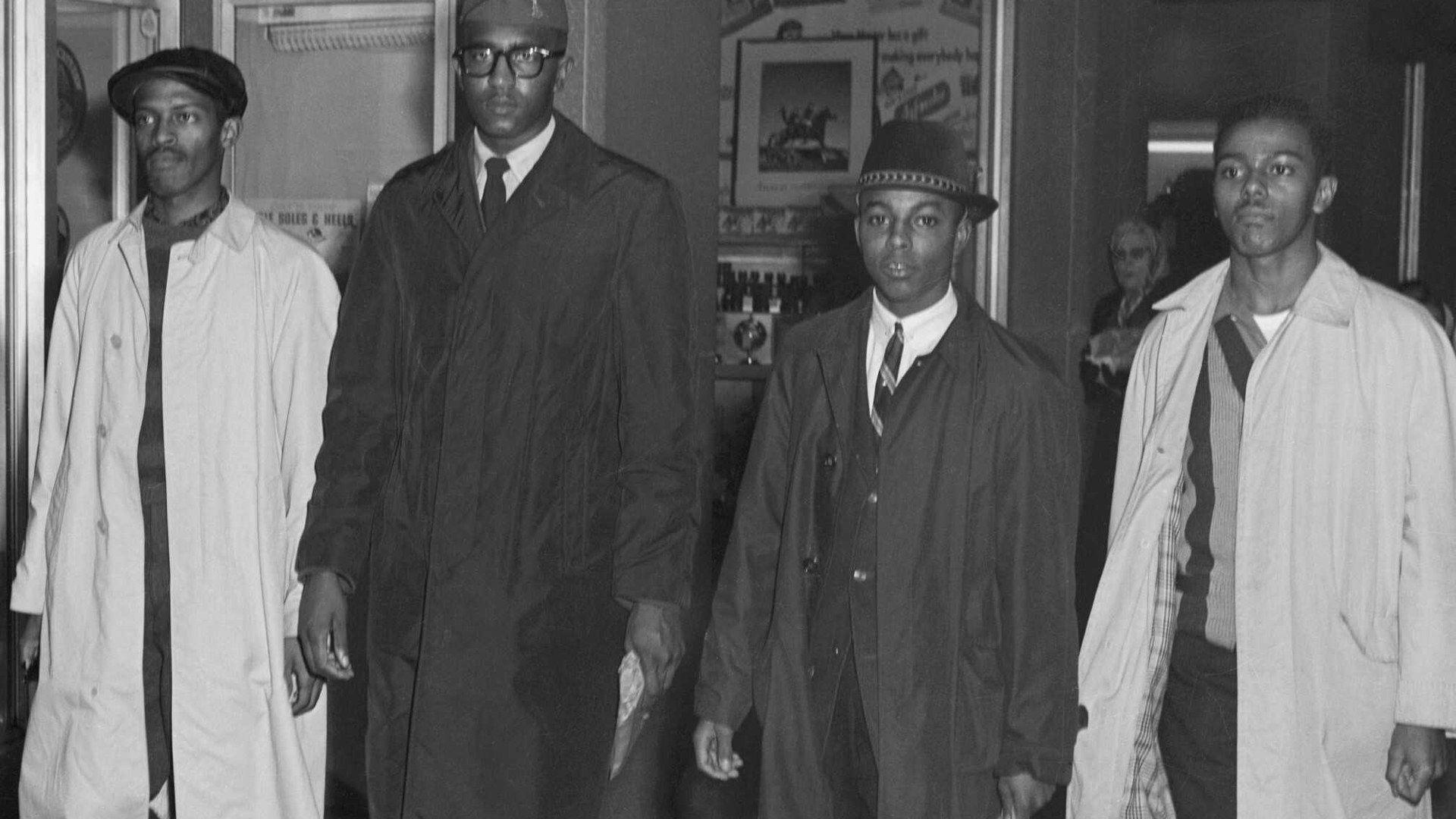 The Greensboro Four walking out of Woolworth in downtown Greensboro in February 1960