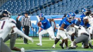 Tennessee State ball carrier runs against Morgan State at Nissan Stadium