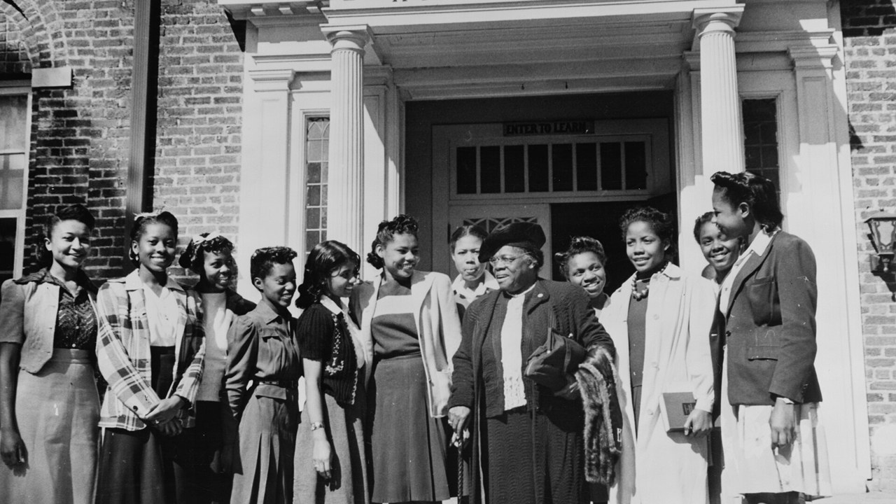 Mary McLeod Bethune saying goodbye to students at her college