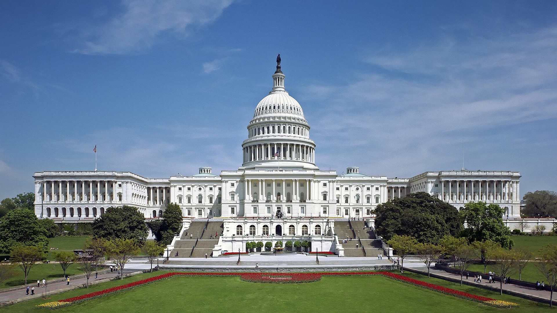 The United States Capitol building in Washington under a blue sky
