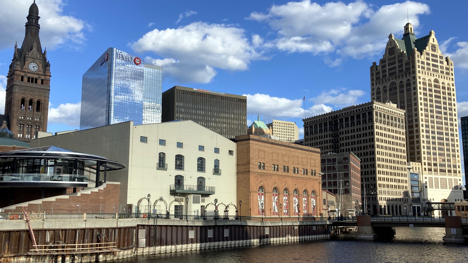 The Milwaukee skyline rises above the Milwaukee River