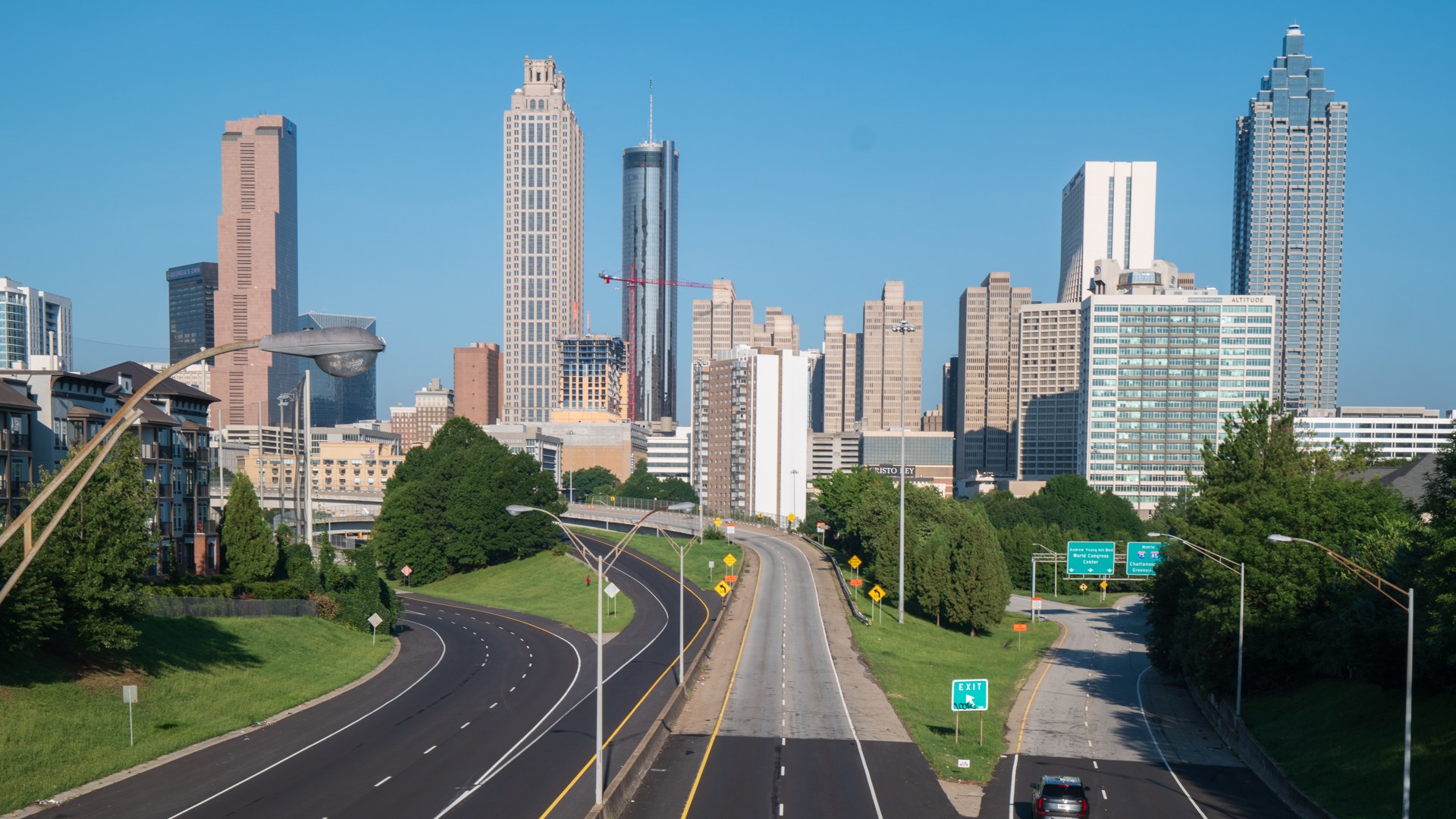 The Atlanta skyline at dusk seen from a bridge