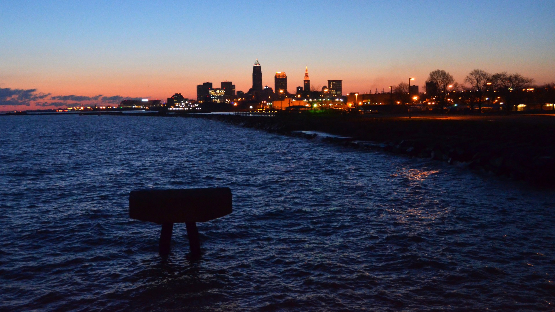 Cleveland skyline at dusk seen across the water