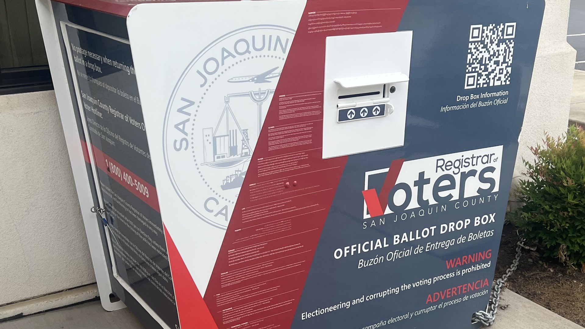 Official ballot drop box for San Joaquin County California with a ballot slot and county seal