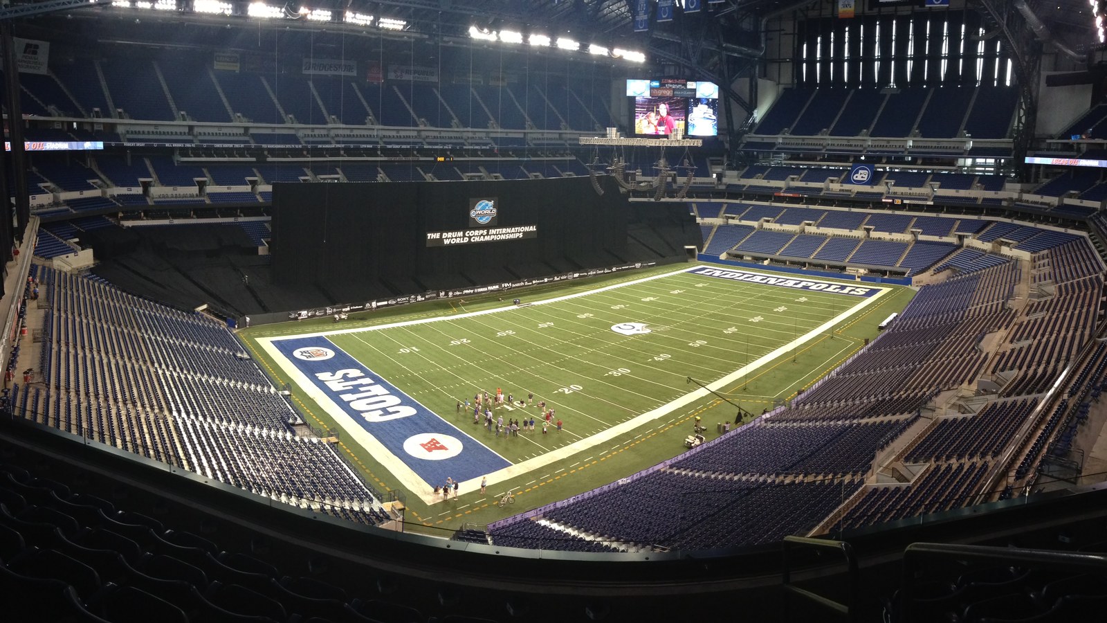 Lucas Oil Stadium interior with the Colts end zone and empty blue seats