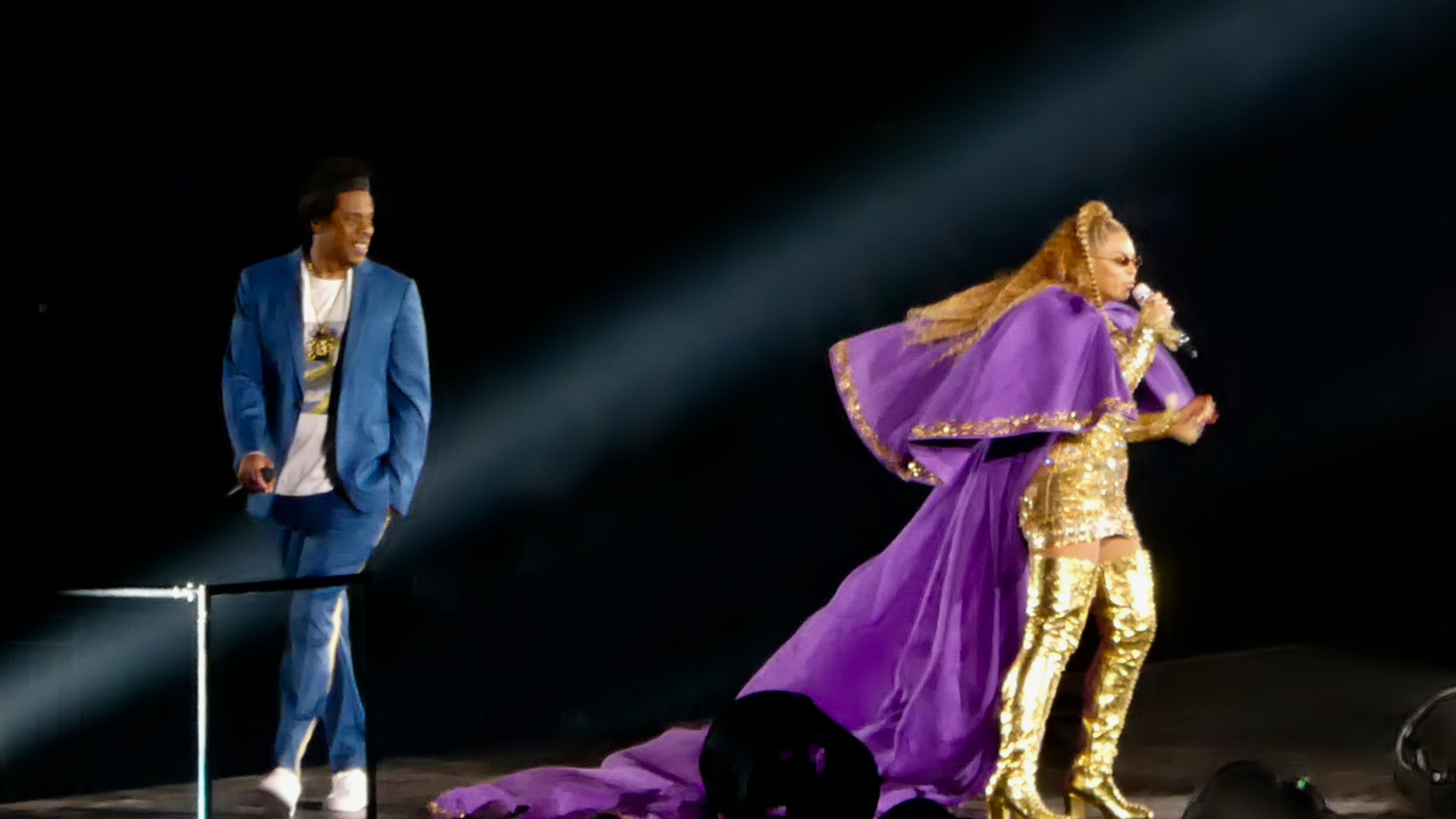 Jay-Z and Beyoncé perform on stage during a stadium tour stop