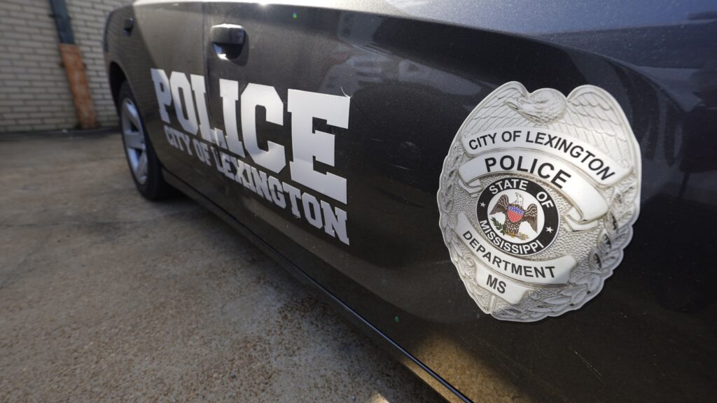 A Lexington Mississippi police cruiser parked outside the police facility near the town square