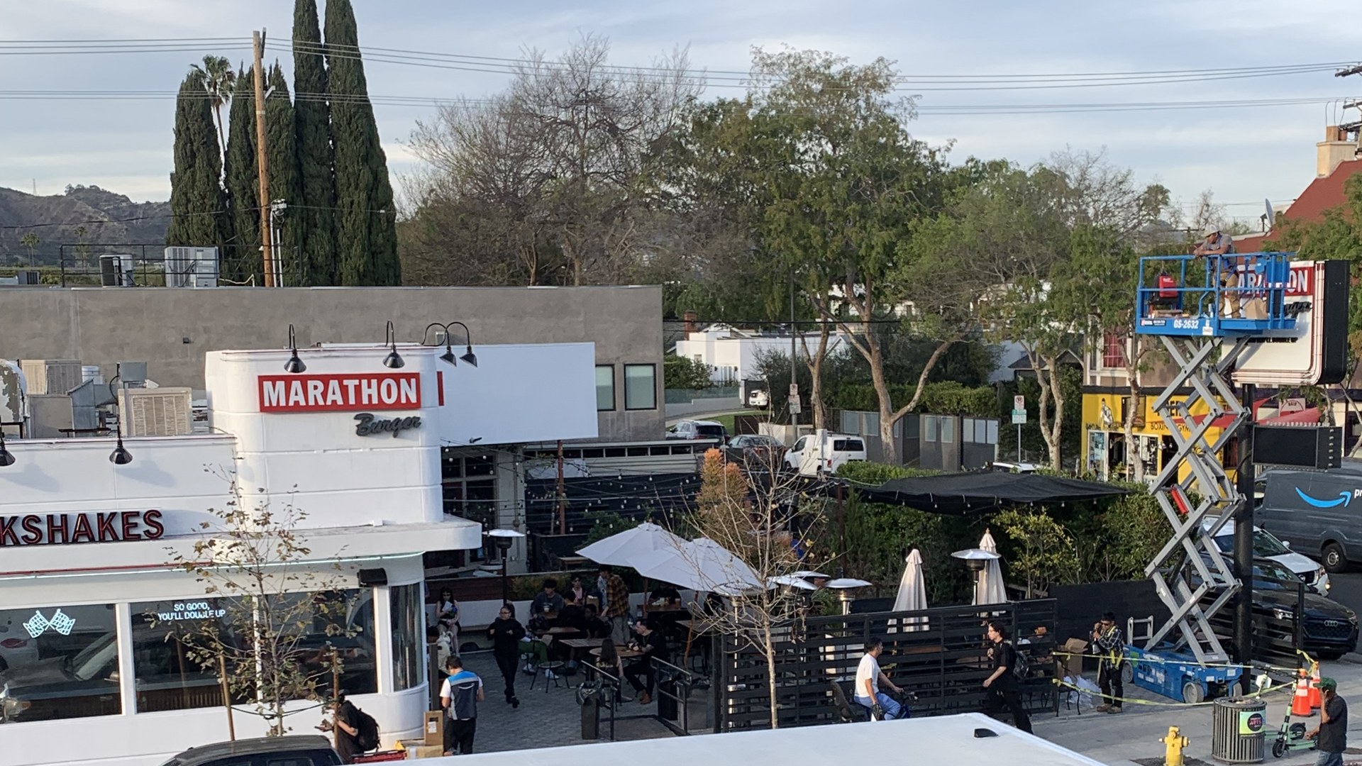Marathon Burger restaurant on Melrose Avenue with guests seated on the outdoor patio