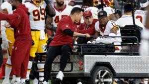Terry McLaurin is carted off the field after injuring his left knee against the San Francisco 49ers