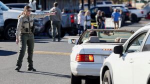 Emergency worker directs traffic at the scene of the Bend Oregon school shooting