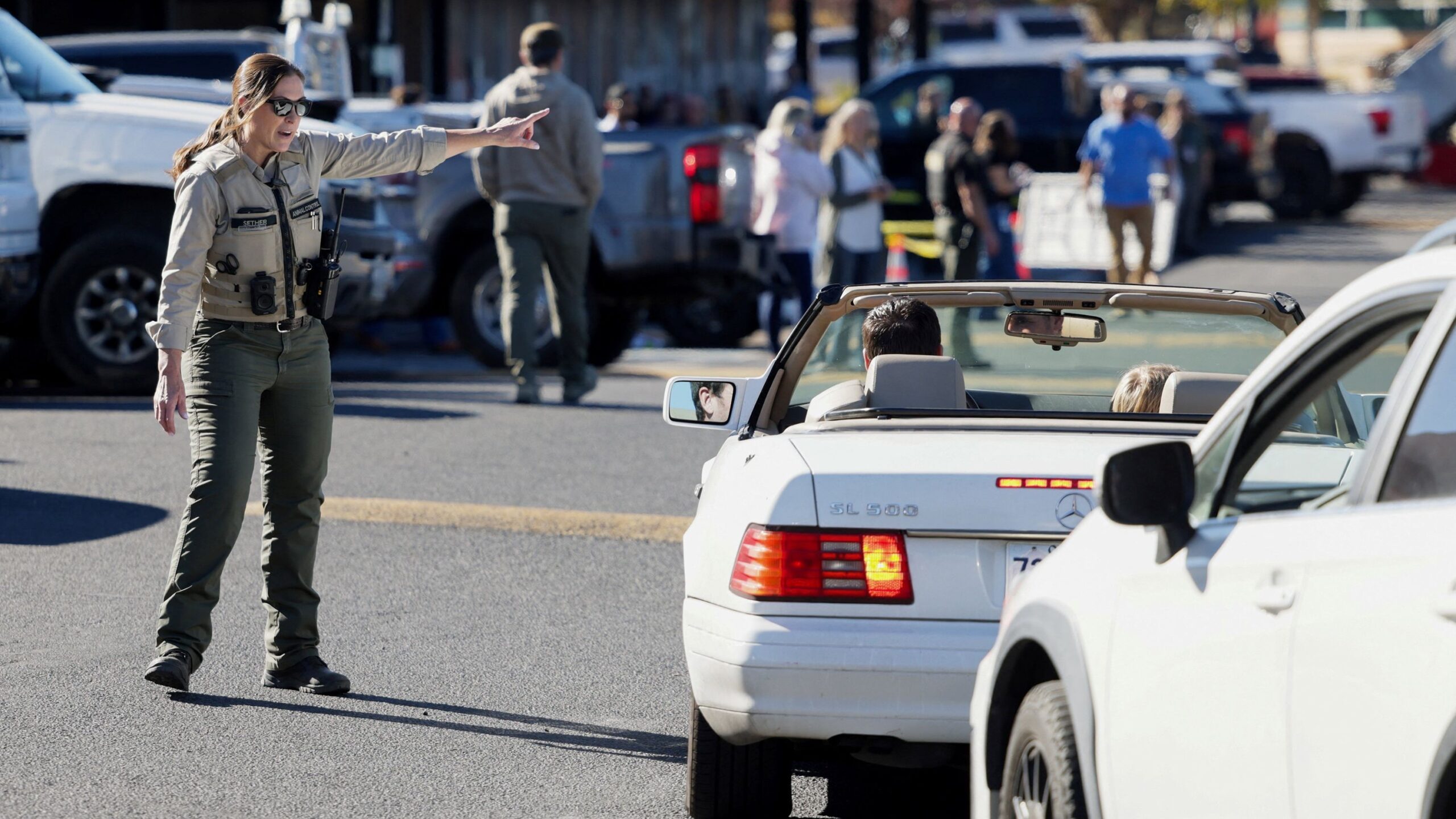 Emergency worker directs traffic at the scene of the Bend Oregon school shooting