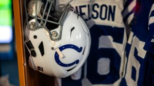 Quenton Nelson number 56 jersey and Indianapolis Colts helmet hanging in the locker room