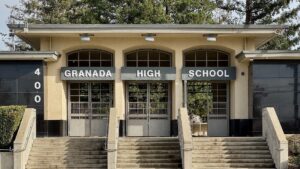 Entrance of a California high school building with the name Granada High School above the doors