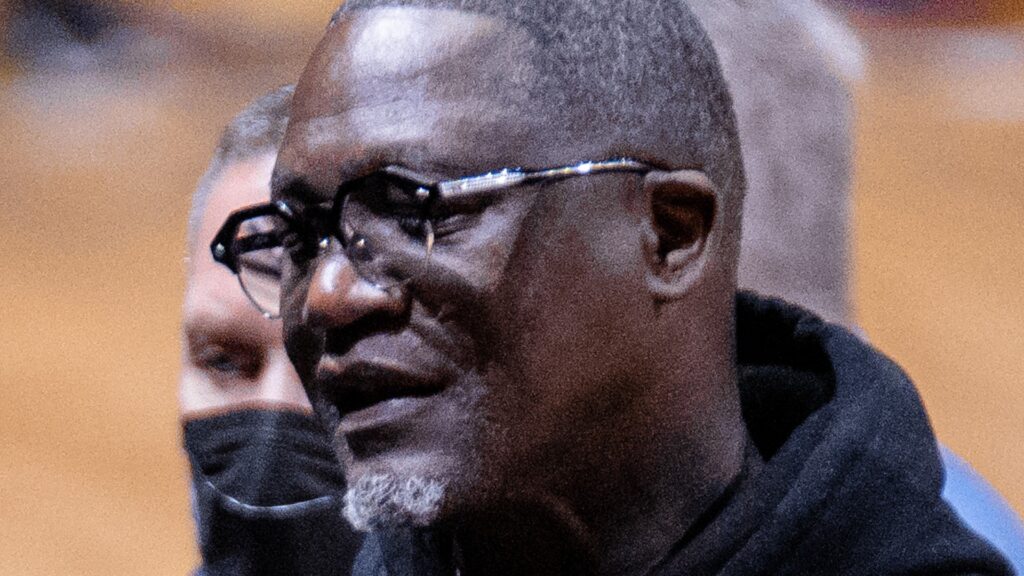 Dominique Wilkins in 2022 wearing glasses and a black hoodie
