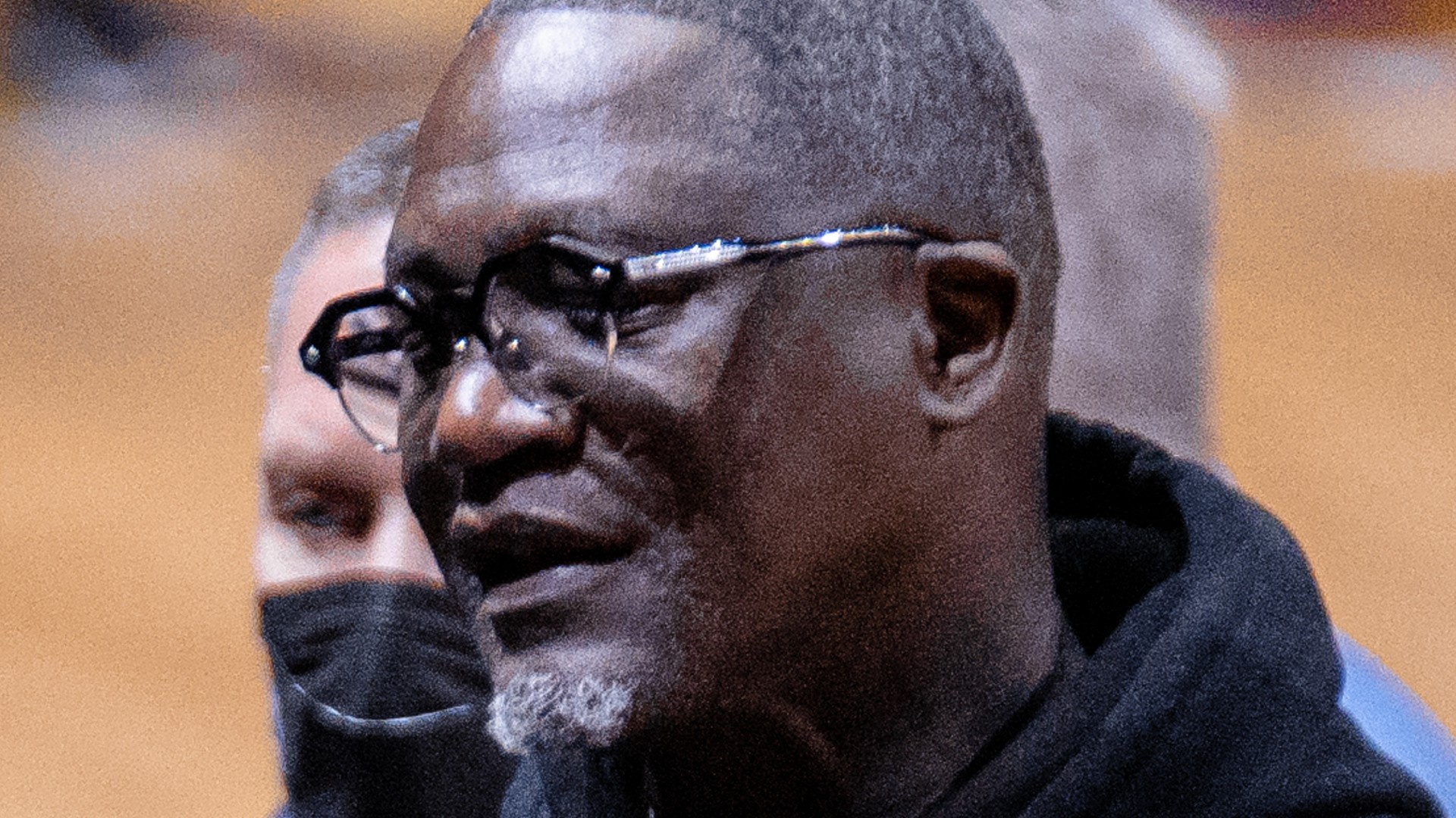 Dominique Wilkins in 2022 wearing glasses and a black hoodie