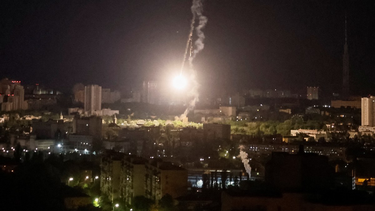Missile interception over Kyiv at night