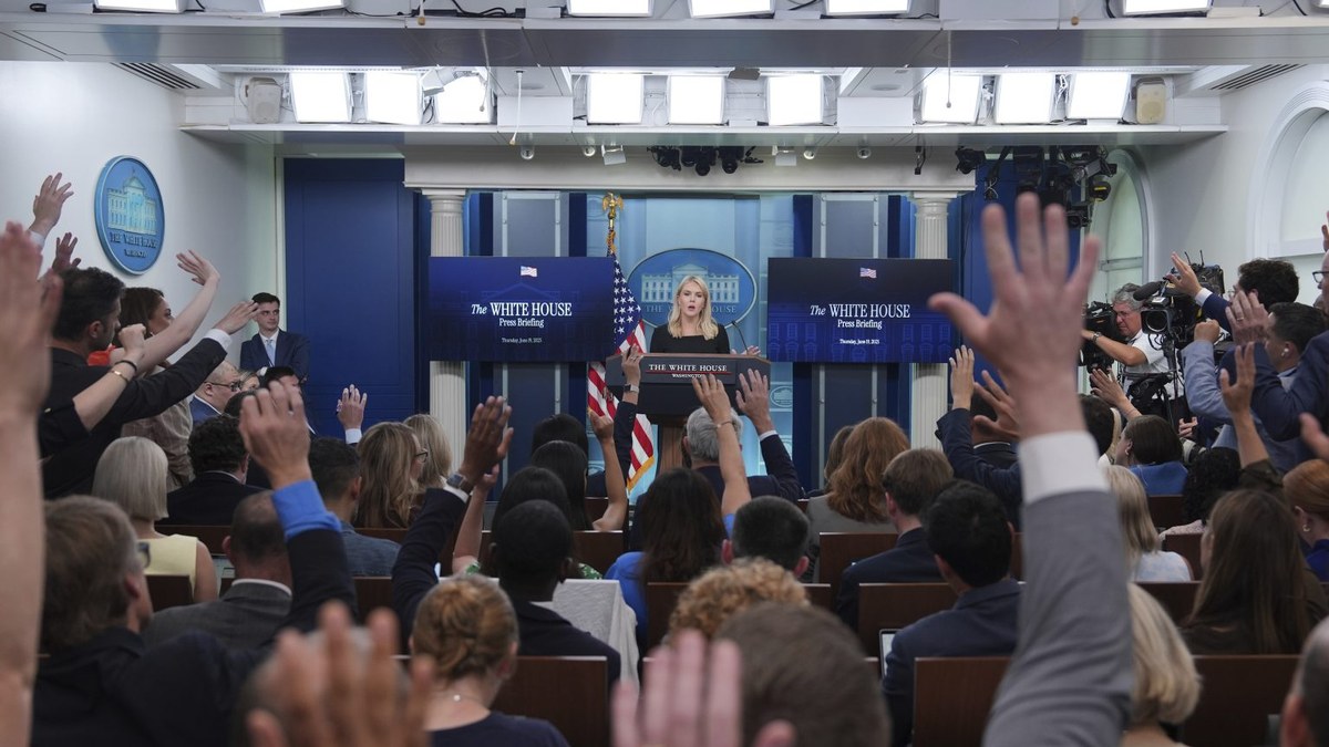 White House press briefing room with reporters